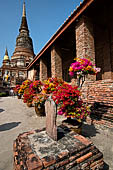 Ayutthaya, Thailand. Wat Yai Chai Mongkhon, the ubosot with the large chedi in the background, note the stone marking the sacred space 